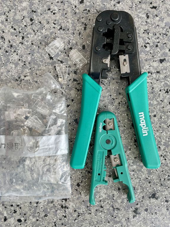 RJ45 crimping tool, wire strippers and RJ45 plugs