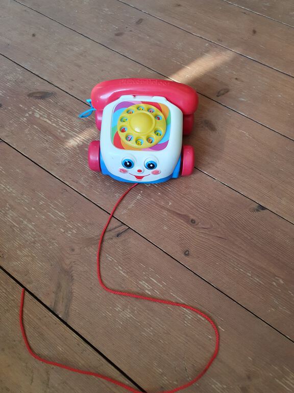 Pull-along telephone toy