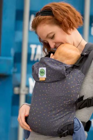 Kahu Baby carrier flocking birds