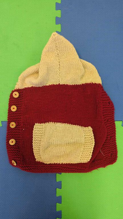 Knitted baby cover