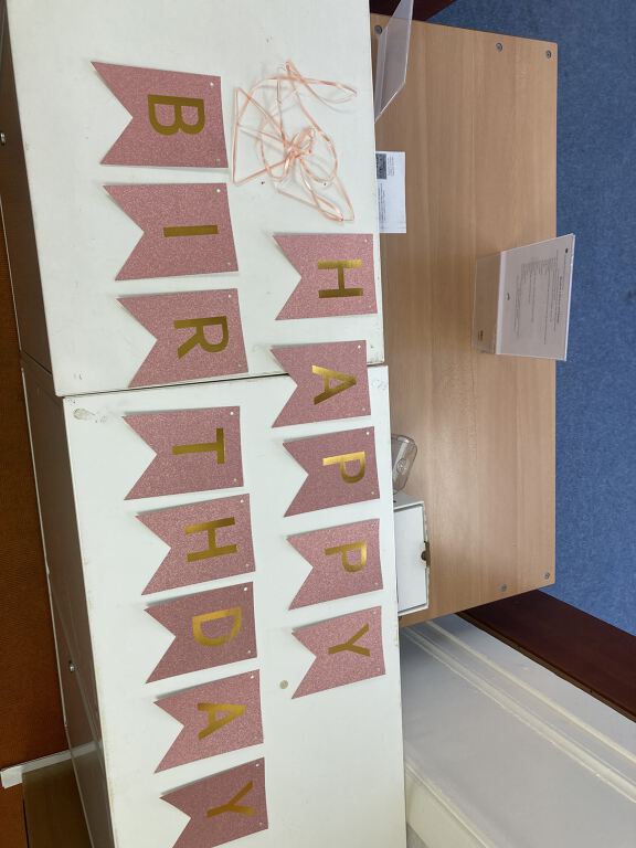 "Happy Birthday" banner in pink